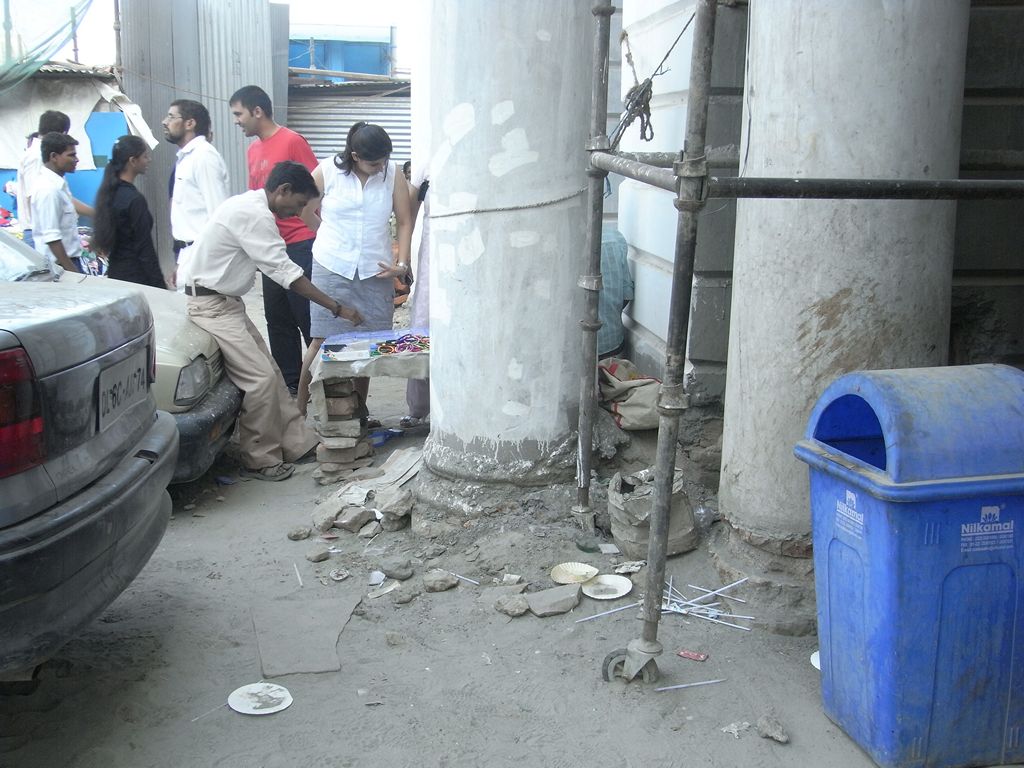 In New Delhi ... a rare rubbish bin near the Keventer flavoured milk depot is mostly ignored by patrons